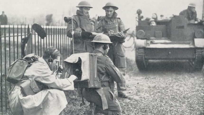 cropped British radio operator in the field war exercise min