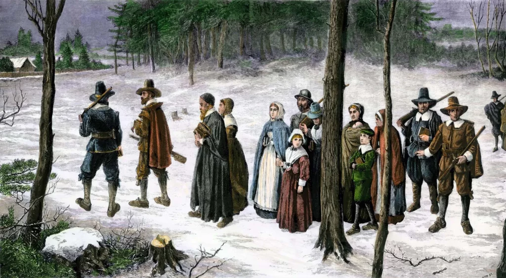 Massachusetts Körfezi Kolonisi'nin Püritenleri karda kiliseye yürüyor.