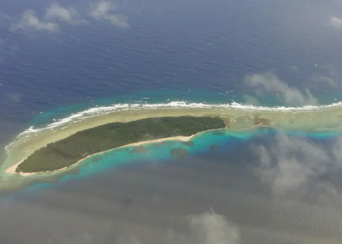 Yükselen deniz seviyesinin etkilerinin görüldüğü Marshall Adası.