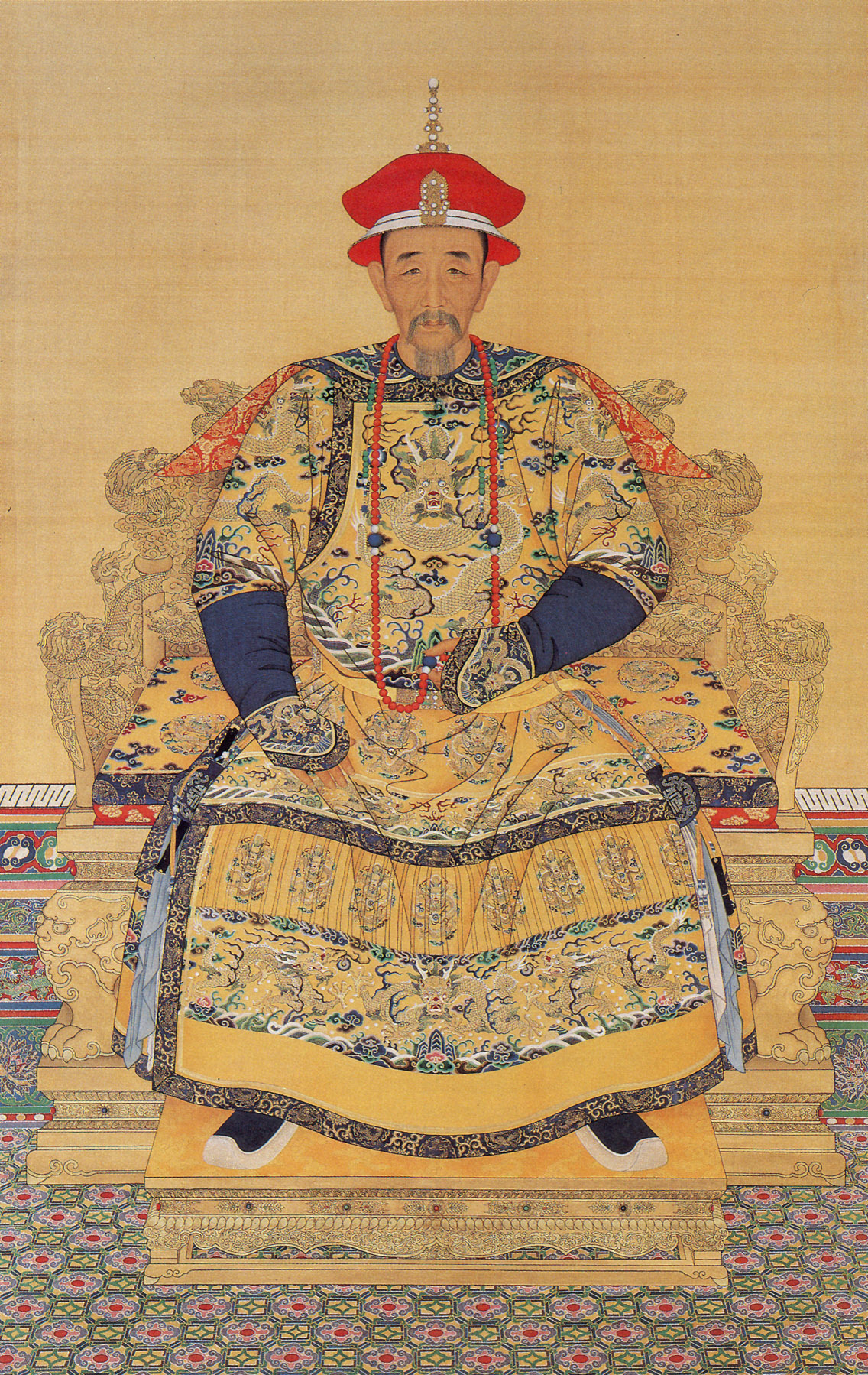 Kangxi İmparatoru'nun saray kıyafetleri içinde portresi.